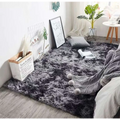 A plush gray shaggy carpet floor mat with soft fluffy texture and subtle gradient shading for cozy interiors