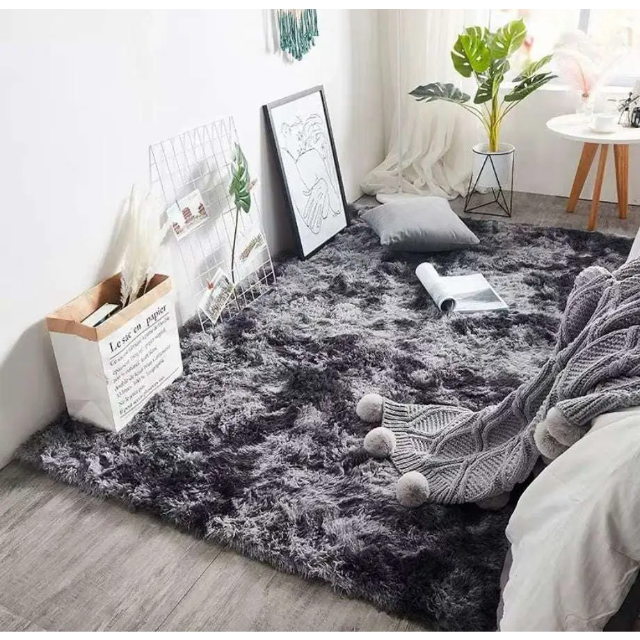 A plush gray shaggy carpet floor mat with soft fluffy texture and subtle gradient shading for cozy interiors