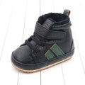 Black textured leather baby shoes with green accent stripes plush lined sports soft sole and velcro straps