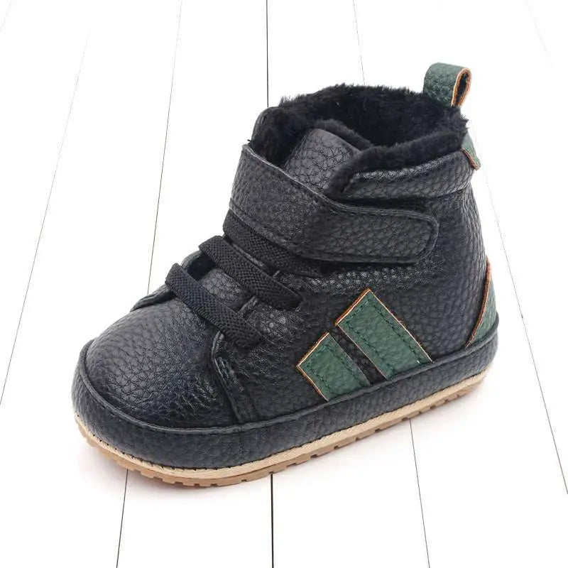 Black textured leather baby shoes with green accent stripes plush lined sports soft sole and velcro straps