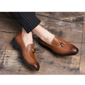 Brown pointed men’s slip woven leather shoes with tassel details and woven leather loafers design