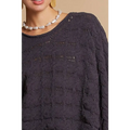Dark gray cable knit cropped sweater with scalloped neckline and intricate textured knit pattern
