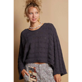 Dark gray cable knit cropped sweater with relaxed fit and textured bell sleeves in knit cropped sweater style