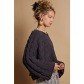 Dark navy cable knit cropped sweater with oversized loose fit and textured pattern in knit cropped sweater style