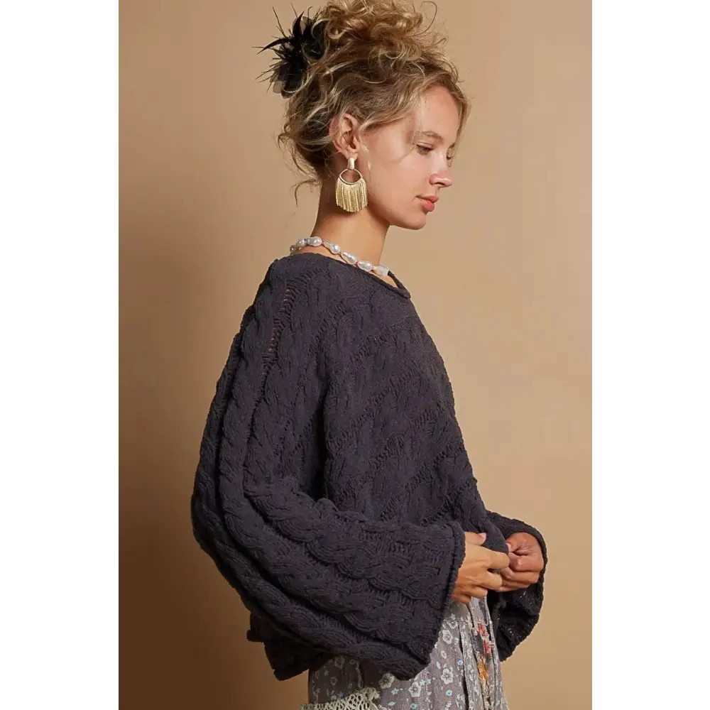 Dark navy cable knit cropped sweater with chunky textured knit and long sleeves perfect for layering