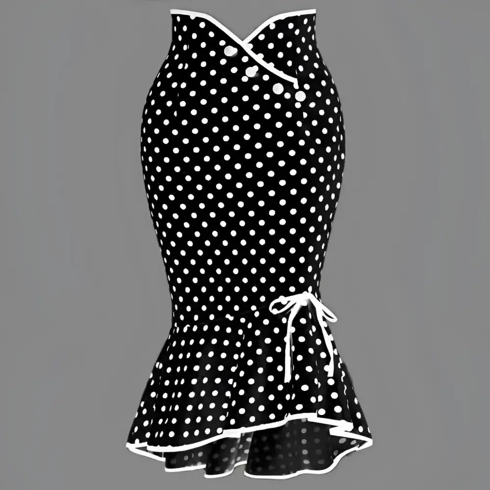 Black and white polka dot midi dress with slim fit fishtail skirt, fitted bodice, three front buttons, and ruffled hem