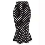 Black and white polka dot slim fit fishtail skirt with fitted waist and flared hem for elegant wear