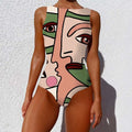 Sleeveless one-piece print lady swimsuit with vintage abstract print face design in green pink and beige tones