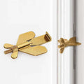 Gold-colored butterfly-shaped winged door lock stopper with threaded screw for portable door lock and security use