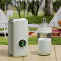 White and gray portable constant temperature baby bottle warmer with digital display and usb charging capability
