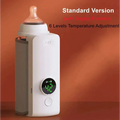 White and gray portable constant temperature baby bottle warmer with digital display showing 42 degrees celsius and usb charging