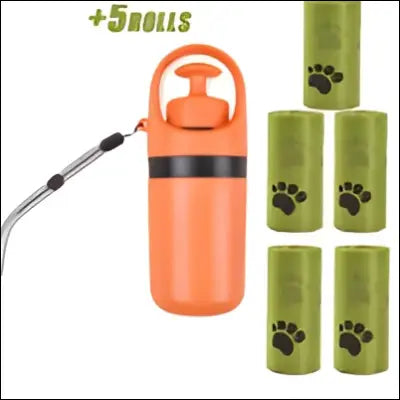 Portable dog poop scooper in orange with black accents and a poop bag dispenser alongside five green paw-printed poop bags