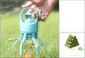 Light blue plastic portable dog poop scooper with six legs and built-in poop bag dispenser handle on top
