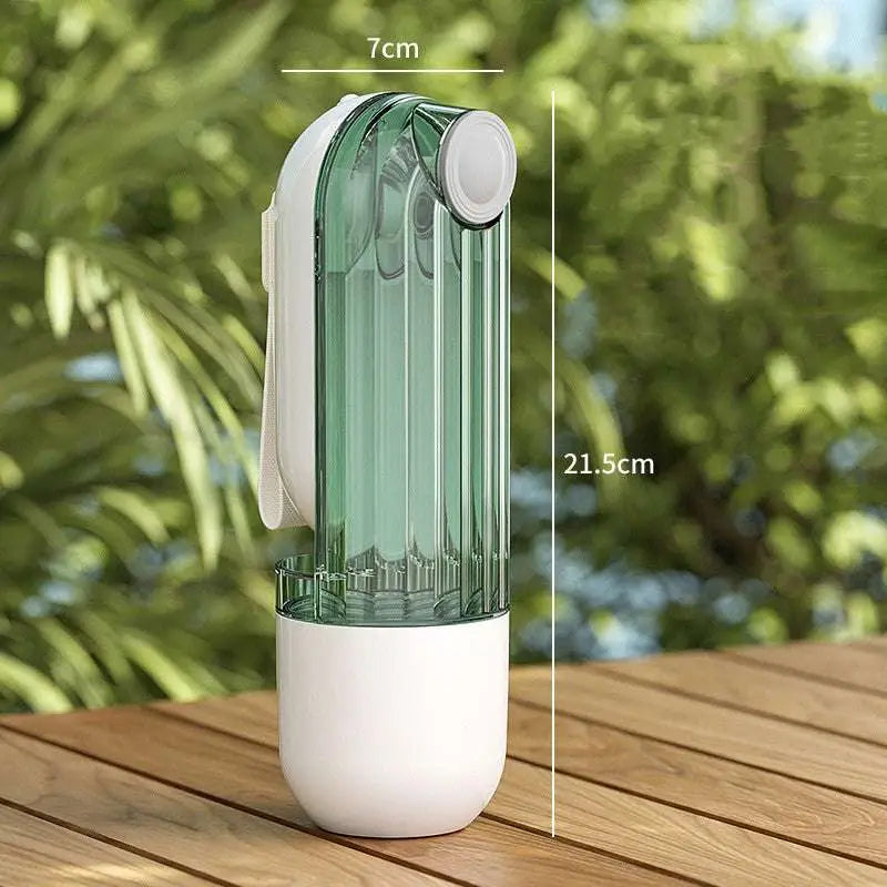 A sleek translucent green and white portable pet water cup with built-in filter for green dog walking use