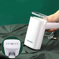 White portable handheld hanging ironing machine with folding handle transparent water tank and adjustable 108-degree angle