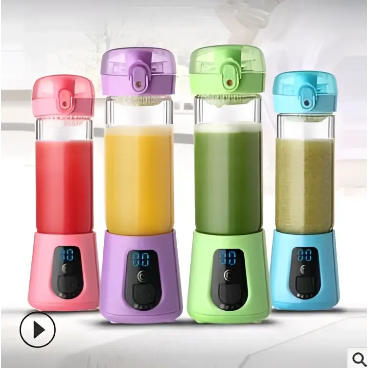 Four colorful portable mini electric juice cup glass blenders with transparent bodies and vibrant lids in pink purple green and blue