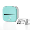 Mint green and white portable mini label printer with circular button printing black lettering thermosensitive double-decker bus illustration