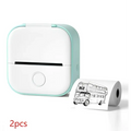 A mint-green and white portable mini label printer with a circular button for black lettering thermosensitive sticky paper rolls
