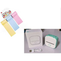 Mint green and white portable mini label printer with circular button and black lettering thermosensitive sticky paper rolls