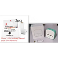 White and teal portable mini label printer with black lettering thermosensitive printing and compact cube design