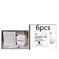 Pink portable mini label thermal printer with black lettering thermosensitive paper and white packaging accessories