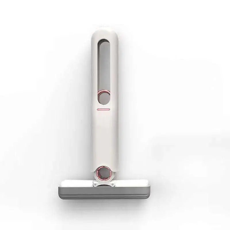 A sleek portable self-squeezing mini mop with absorbent cotton head in white and gray with rose gold accents