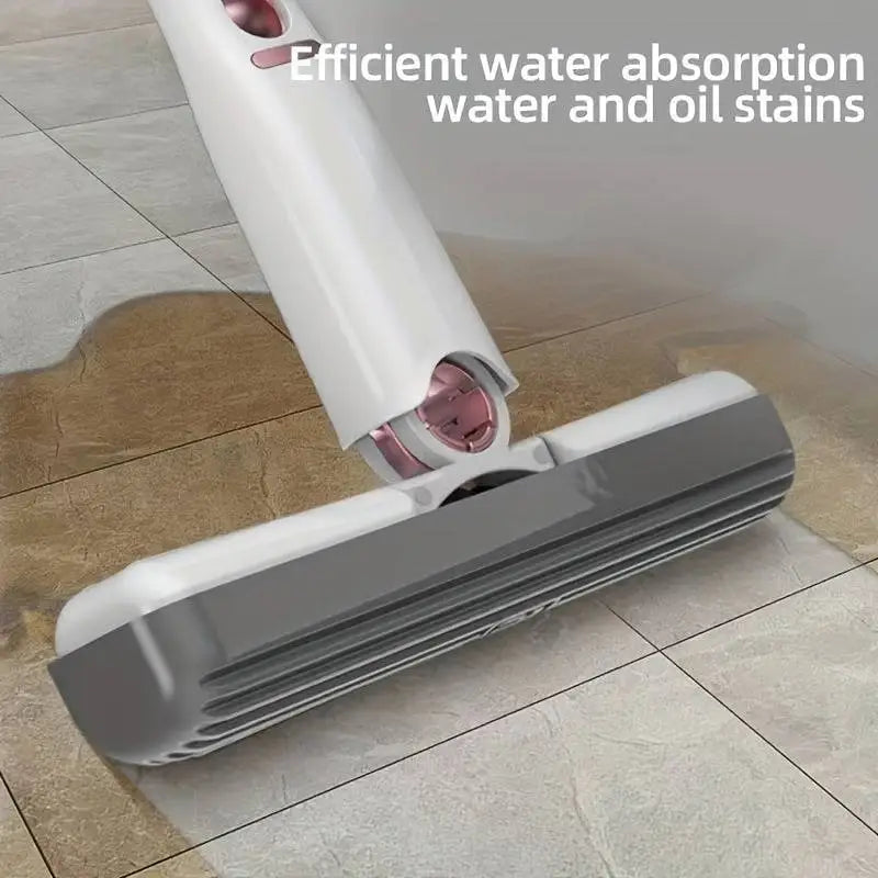 Portable self-squeezing mini mop with white and gray absorbent cotton head and pink accents for efficient cleaning