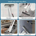 White and gray portable self-squeezing mini mop with absorbent cotton head for cleaning various surfaces