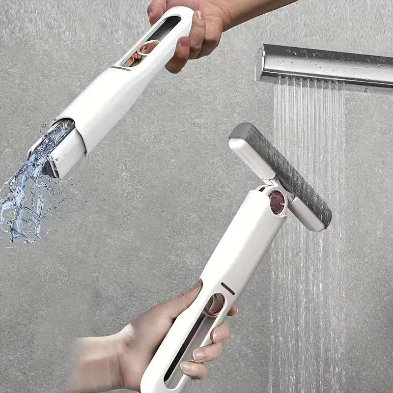 White portable self-squeezing mini mop with absorbent cotton head gray scrubbing head and rose gold accents handheld