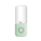 Mint green and white mini portable blender with clear glass cup for easy use as a portable usb automatic juicer