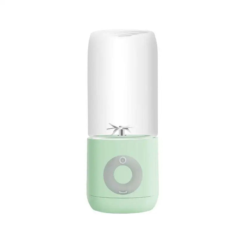 Mint green and white mini portable blender with clear glass cup for easy use as a portable usb automatic juicer