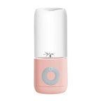 Pink portable usb automatic mini juicer with clear glass container and silver blade assembly for personal use