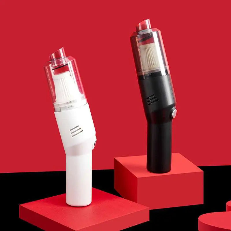 Two portable wet dry compact handheld vacuum cleaners in white and black with transparent dust collection chamber