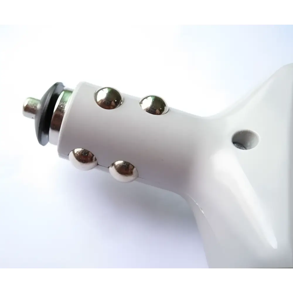 White ceramic car transformer with silver metallic studs and black power supply for mobile device charging