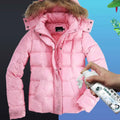 Pink puffer jacket with fur-lined hood and quilted design perfect for use with powerful grease cleaning spray