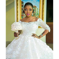 White off-the-shoulder pregnant women princess wedding dress with lace sleeves and intricate floral appliqués