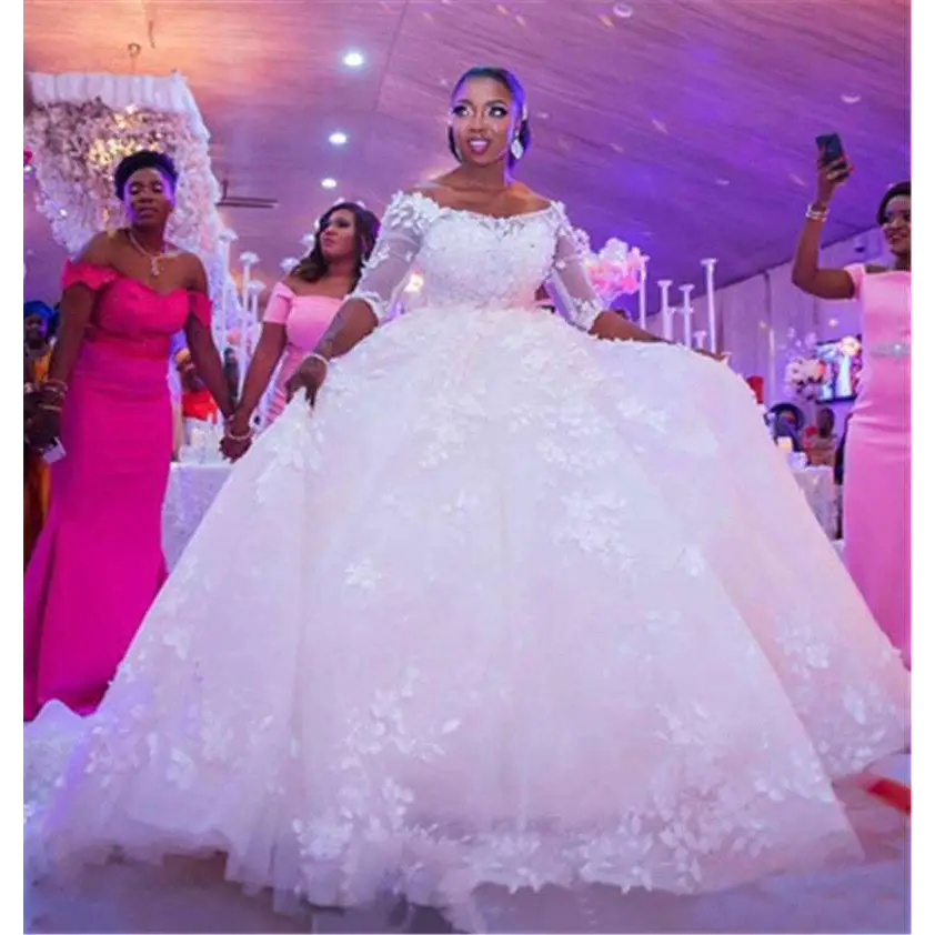 White off-the-shoulder pregnant women princess wedding dress with voluminous skirt and intricate lace sleeves detailing