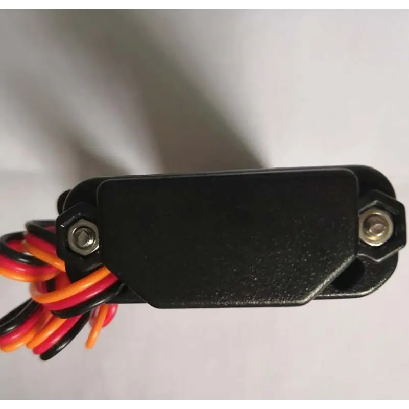 Black rectangular premium gps tracker with hexagonal screws and bundled red orange and black wires for cars and motorcycles