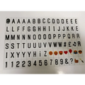 Black 3d-printed alphabet and emoji stickers on transparent backing for premium led cinema lightbox accessory