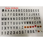 Black plastic letter and emoji stickers in a grid for premium led cinema lightbox featuring letters numbers symbols and colorful emojis