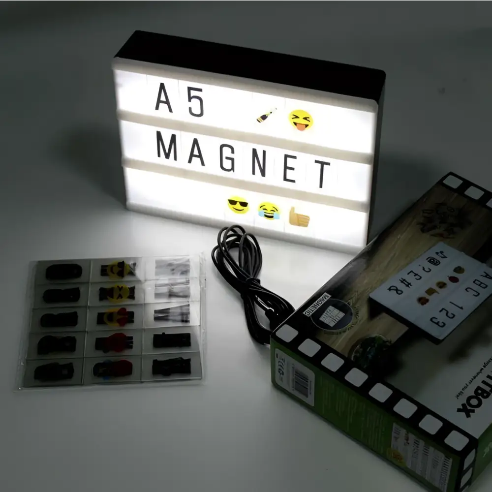 White premium led cinema lightbox featuring black letters and emoji symbols on an illuminated letterboard magnet
