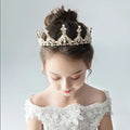 Princess girl diamond crown crystal headband featuring an intricate filigree gold-toned design with rhinestones and pearls