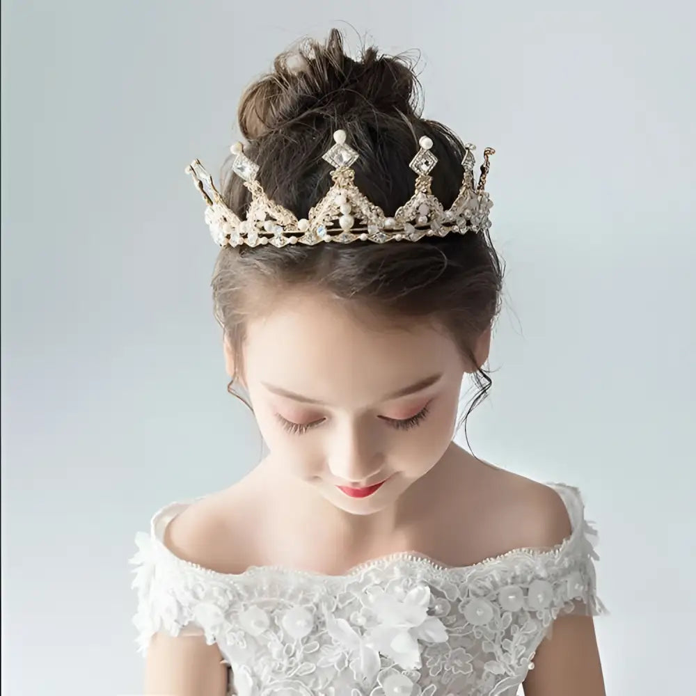 Princess girl diamond crown crystal headband featuring an intricate filigree gold-toned design with rhinestones and pearls