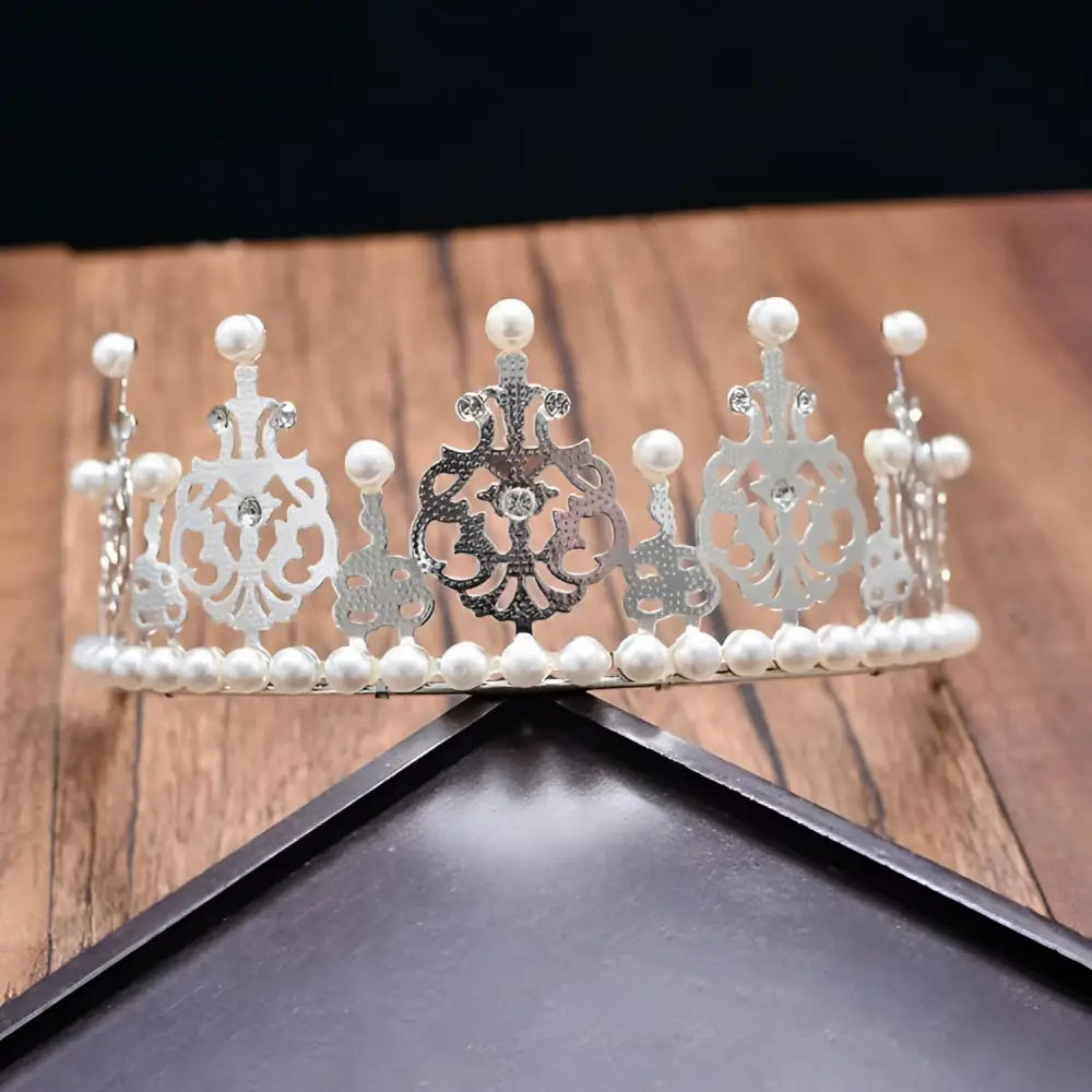 Silver princess girl diamond crown crystal headband with intricate filigree adorned with white pearls and clear rhinestones