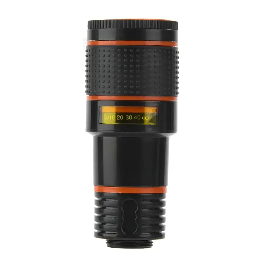 Professional telephoto lens 12x with black and orange textured grip rings and yellow digital display showing focal lengths