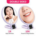 Lavender-colored foldable handle mirror with 10x magnification and 1x high definition double-sided compact design