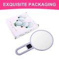 Lavender-colored foldable handle mirror with 10x magnification and sleek ergonomic circular reflective surface
