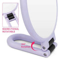 Lavender-colored foldable handle mirror with 10x magnification features a 360-degree rotating base and bidirectional hinge