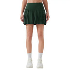 Dark green pleated athletic skirt showing the back side of the purple double layer points exercise skort for three points exercise