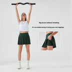 Dark green pleated athletic skirt designed as a purple double layer points exercise skort for three points exercise use